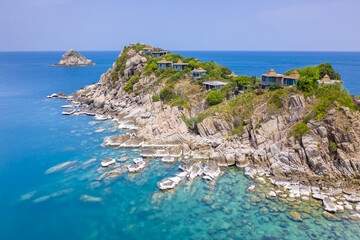 Clean Clear Blue Ocean Sea Water with rocks beach no people copy space paradise tropical island...