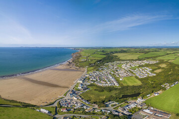 Little Haven, Pembrokeshire, Wales drone aerial landscape photo with copy space green and blue - Powered by Adobe