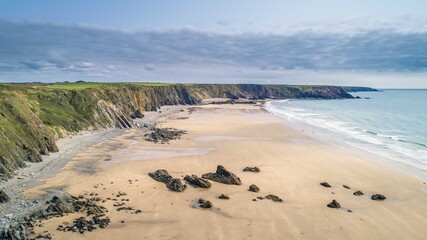 Gateholm Island at Marloes Beach, Pembrokeshire, Wales, drone aerial shot with copy space