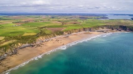 Gateholm Island at Marloes Beach, Pembrokeshire, Wales, drone aerial shot with copy space