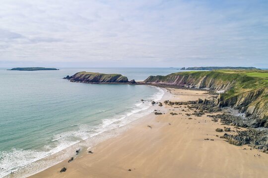 Gateholm Island at Marloes Beach, Pembrokeshire, Wales, drone aerial shot with copy space
