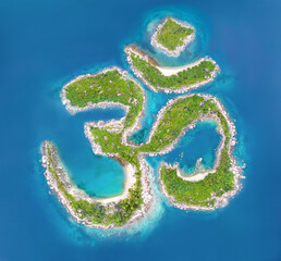Om Ohm Aum Holy Mantra Hindu Buddhist Symbol Sign Icon Image Drone Aerial Island Composite with copy space green and blue coastal scene with copy space