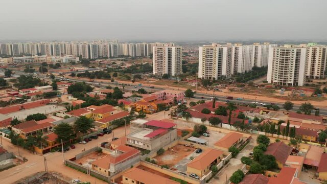 Travelling front, drone, Centrality of Zango, Luanda, Angola, Africa,  social contrasts, harsh realities today 2
