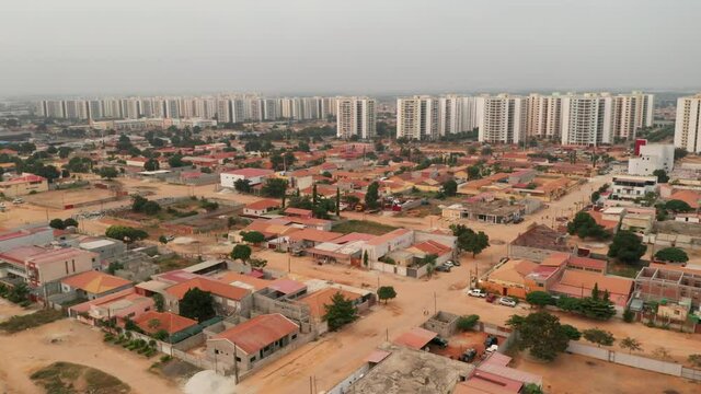 Travelling front, drone, Centrality of Zango, Luanda, Angola, Africa,  social contrasts, harsh realities today 1