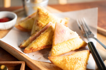 Club sandwich with egg and ham