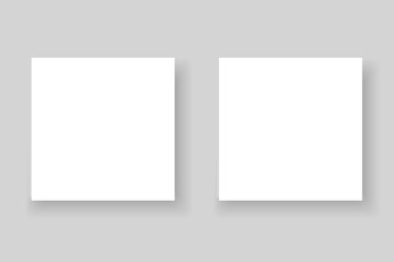 two blank square size paper mockup isolated on a grey background