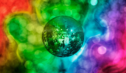 Party disco mirror ball reflecting colorful  lights 