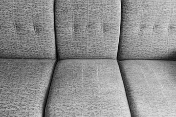 Texture detail of grey cover soft cotton cloth sofa
