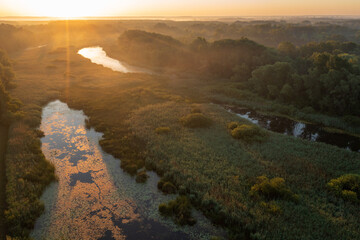 Aerial view of a sunrise on the oxbow lake on the Drava River