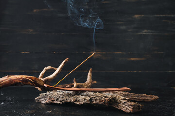 Beautiful composition with incense on dark background