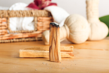 Palo Santo and spa supplies on wooden table