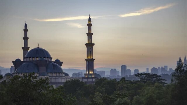 timelapse : majestic view of a beautiful mosque during sunrise