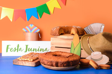 Traditional food for Festa Junina (June Festival) on color background