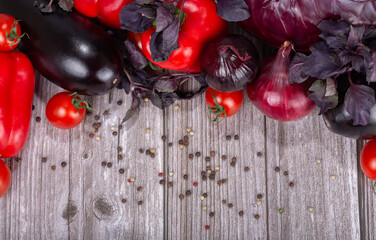 dark ripe vegetables half frame on wooden table