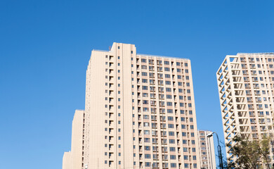Fototapeta na wymiar Urban residential area under the blue sky