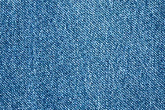 Denim blue jeans texture close up background top view