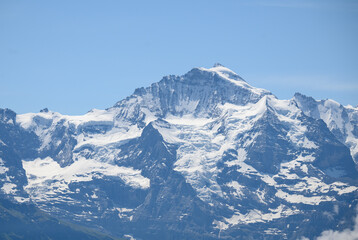 Fototapeta na wymiar peak of Jungfrau with glaciers in the Bernese Alps