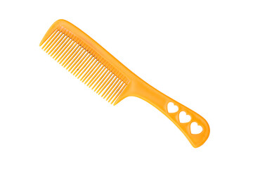 yellow plastic hair comb isolated on white background