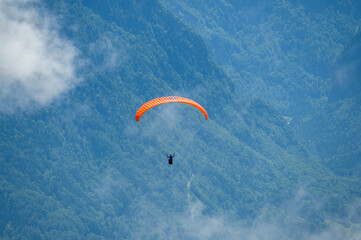 paraglide flyer in the Bernese Alps