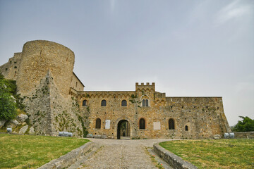 Fototapeta na wymiar Bovino, Italy, June 23, 2021. Facade of a medieval castle in an old village in southern Italy.