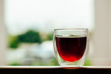 Glass of coffee on the balcony
