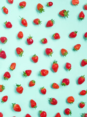 Fresh strawberry pattern on turquoise background.