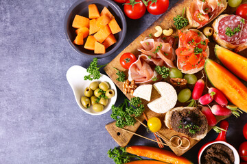antipasto- buffet food on wooden board