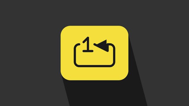 Yellow Repeat track music player icon isolated on grey background. The sign is a round curved arrow and the number one. 4K Video motion graphic animation