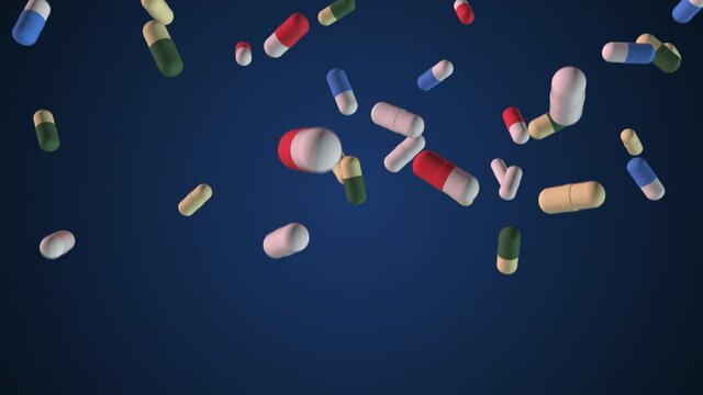 Super slow-motion shooting of colorful pills falling to the bottom. Loop, alpha channel. Medicines, tablets, capsules, painkillers, antibiotics, vitamins, Medicine, healthcare pharmacy concept