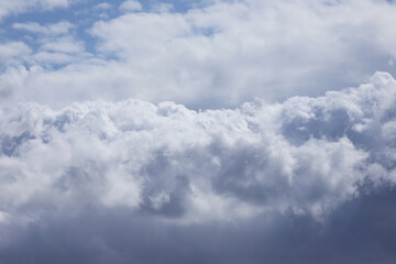 Cumulus clouds in the summer sky.