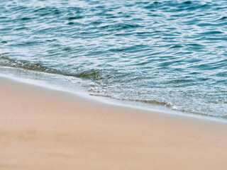 Beach sand sea water summer background.