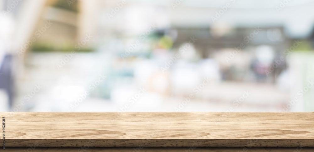 Aufkleber empty wood table in coffee shop background bokeh light .mock up for display of product,banner for ad