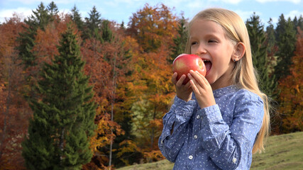 Kid Eating Apples in Camping in Mountains, Child Eats Fruits on Meadow, Hungry Girl at Picnic Outdoor in Nature, Alpine View