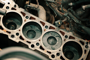 Pistons and cylinder head of engine block vehicle. Motor capital repair. Sixteen valve and four...