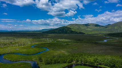 Picturesque landscape with river and mountains. Kamchatka peninsula