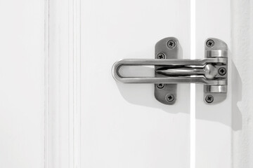 Close up of door security locked doors in hotel on wooden door-Security or safety concepts.