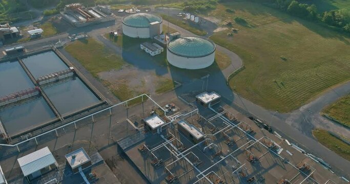 Aerial top view recirculation sedimentation tank, water treatment plant for big city from water management