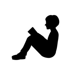 Vector isolated silhouette of a teen boy sitting on the floor with a book on his lap and reading