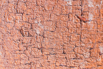 Old abstract vintage brown peeling paint texture. Wooden background.