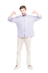 Vertical full length isolated shot of confident mature Caucasian man pointing fingers at himself, white background
