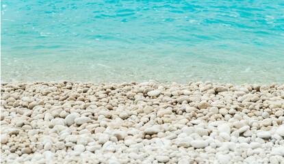 Low angle view of beautiful beach with round pebbles