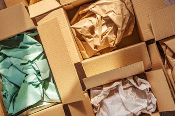 Recycled packaging ,Cardboard boxes with crumpled paper inside for packaging goods from online stores, eco friendly packaging made of recyclable raw materials