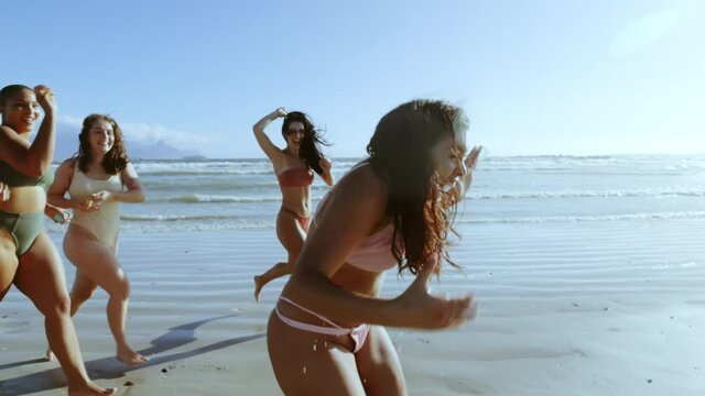 Friends having fun on beach holiday