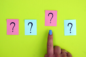 There are many question marks on the stickers.