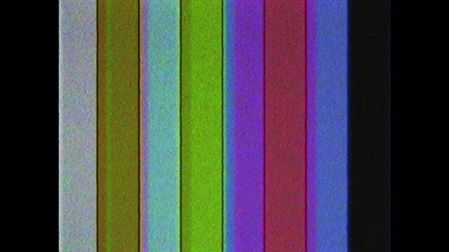 SMPTE color bars with VHS effect. SMPTE color stripe technical problems. Test pattern from a tv transmission with colorful bars. Color Bars data glitches.