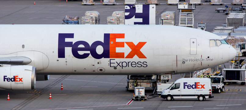 cologne, north rhine westphalia/germany - 26 06 2021: a fedex cargo airplane beeing loaded panorama