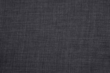 Fototapeta na wymiar Black grey linen fabric cloth texture for background, natural textile pattern.