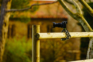 Camera on tripod take photo