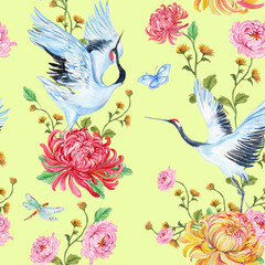 Seamless pattern with birds cranes and flowers on an isolated yellow background Ornament for printing on textiles, wallpaper