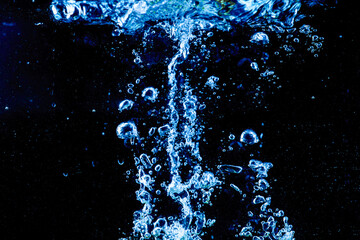 Obraz premium distribution of water black background.soft focus.